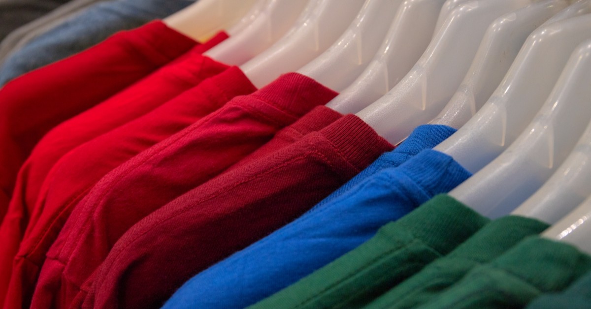 Colorful shirts on hangers